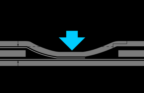 Conductive contact pads on a keyboard circuit board, essential for registering keypresses in membrane switches